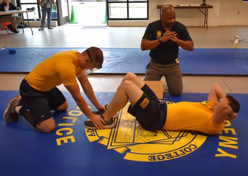 cadets preparing for situps